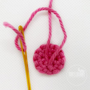How to Crochet a Button from TurtleBunny Creations - Weave both tails to the center