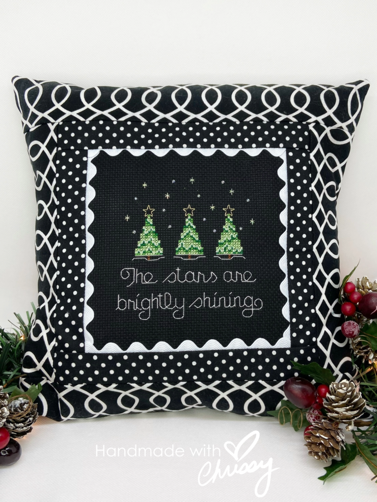 Christmas Cross-Stitch pattern, Brightly Shining, by Handmade with Chrissy finished as a pillow