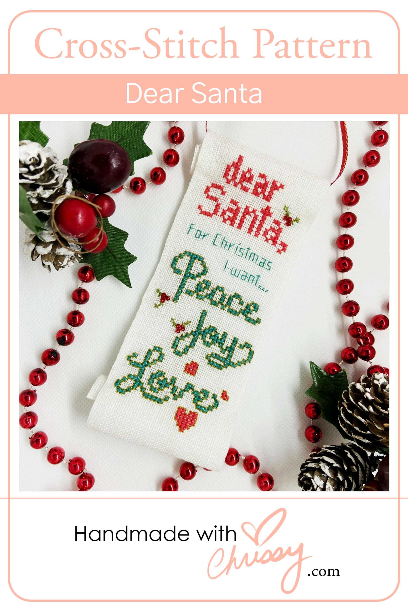 Dear Santa, Christmas Cross Stitch pattern by Chrissy Habblett of Handmade with Chrissy, finished as an ornament in a scroll shape